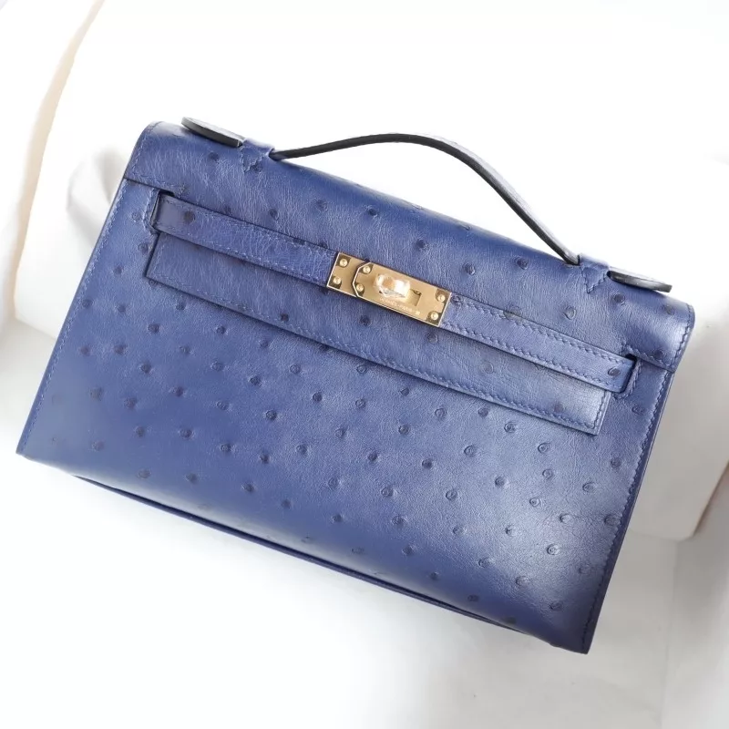 77 BIeu Iris ostrich kelly pochette with GHW