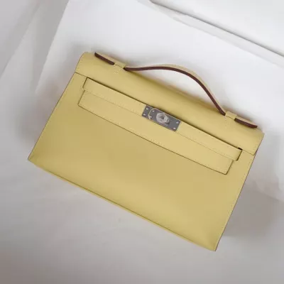 1z jaune pussin swift kelly pochette with phw