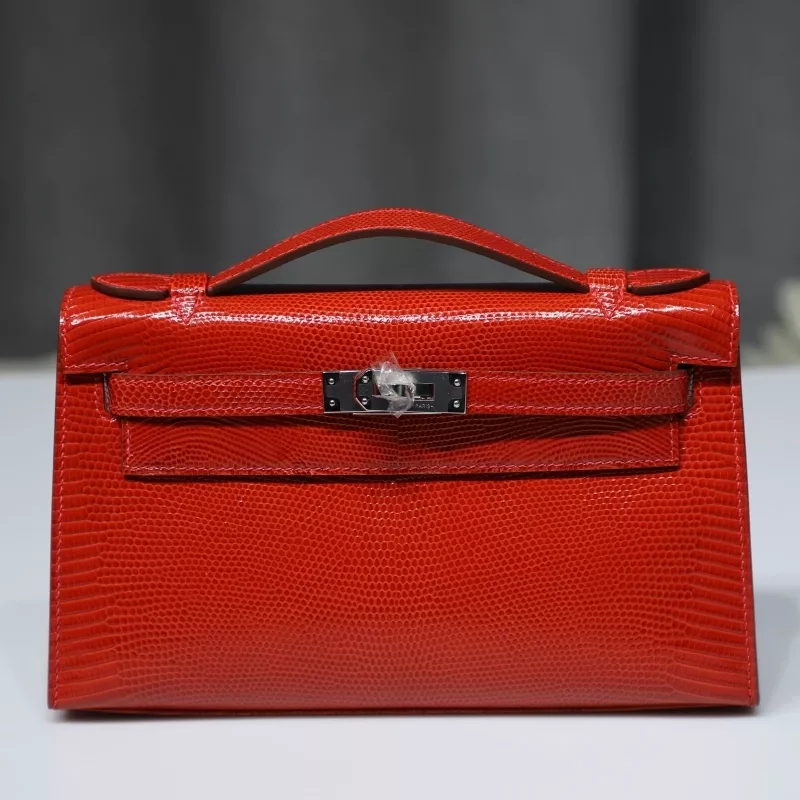 53 Rouge Vif lizard kelly pochette with phw