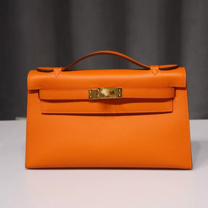 Orange swift kelly pochette with ghw