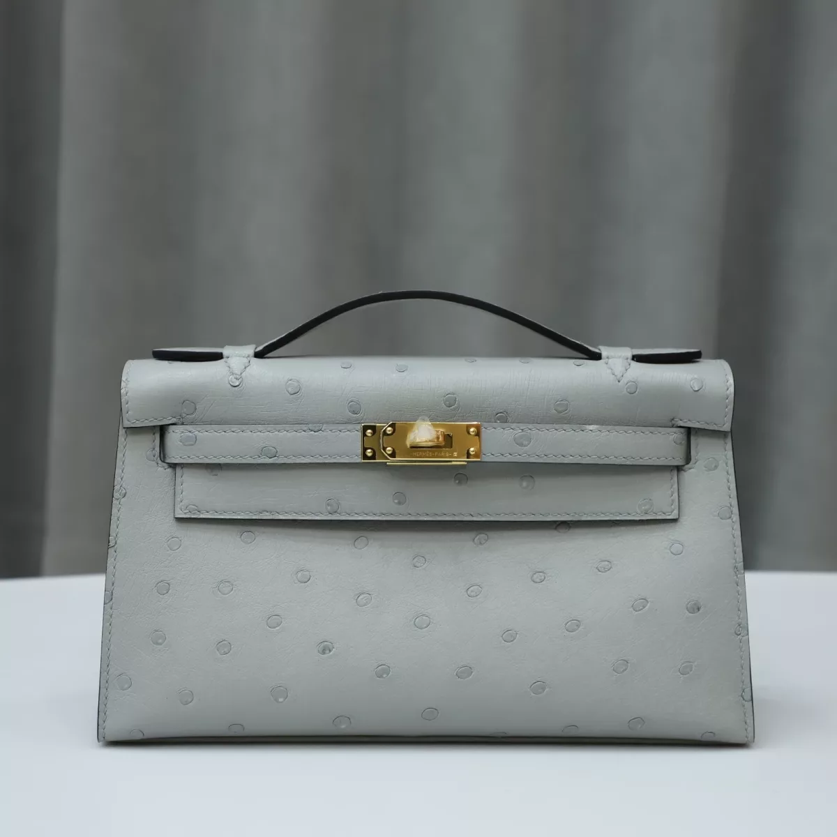 8U BIue GIacier Ostrich Kelly Pochette With GHW