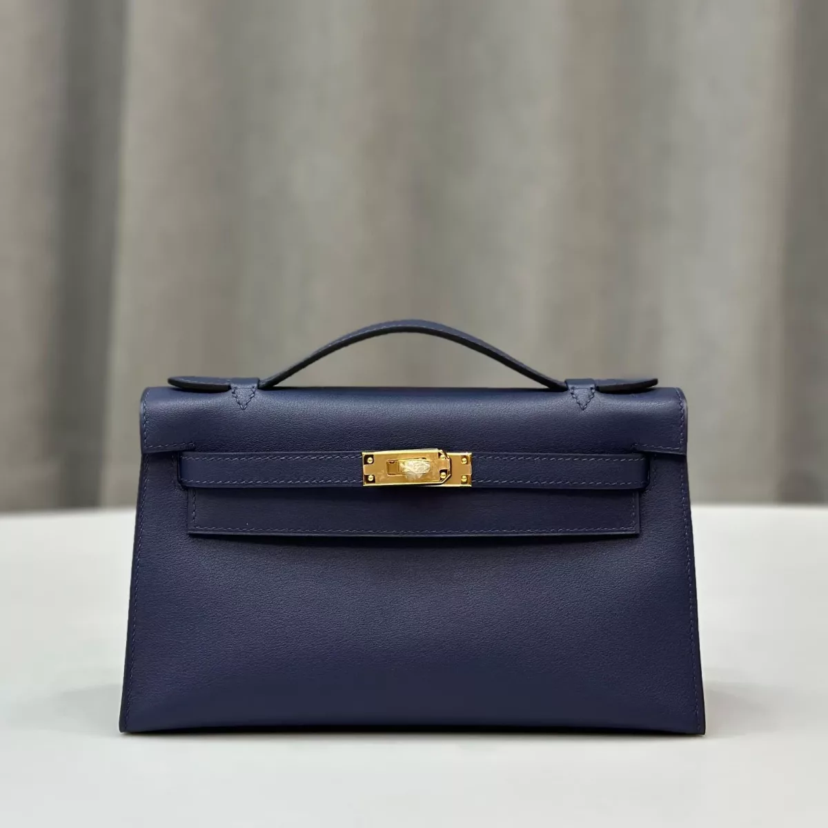 Blue sapphire swift kelly pochette with ghw