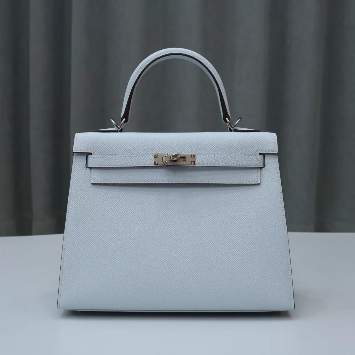 T0 Blue Brume Epsom Kelly 25 Sellier PHW With white stitching