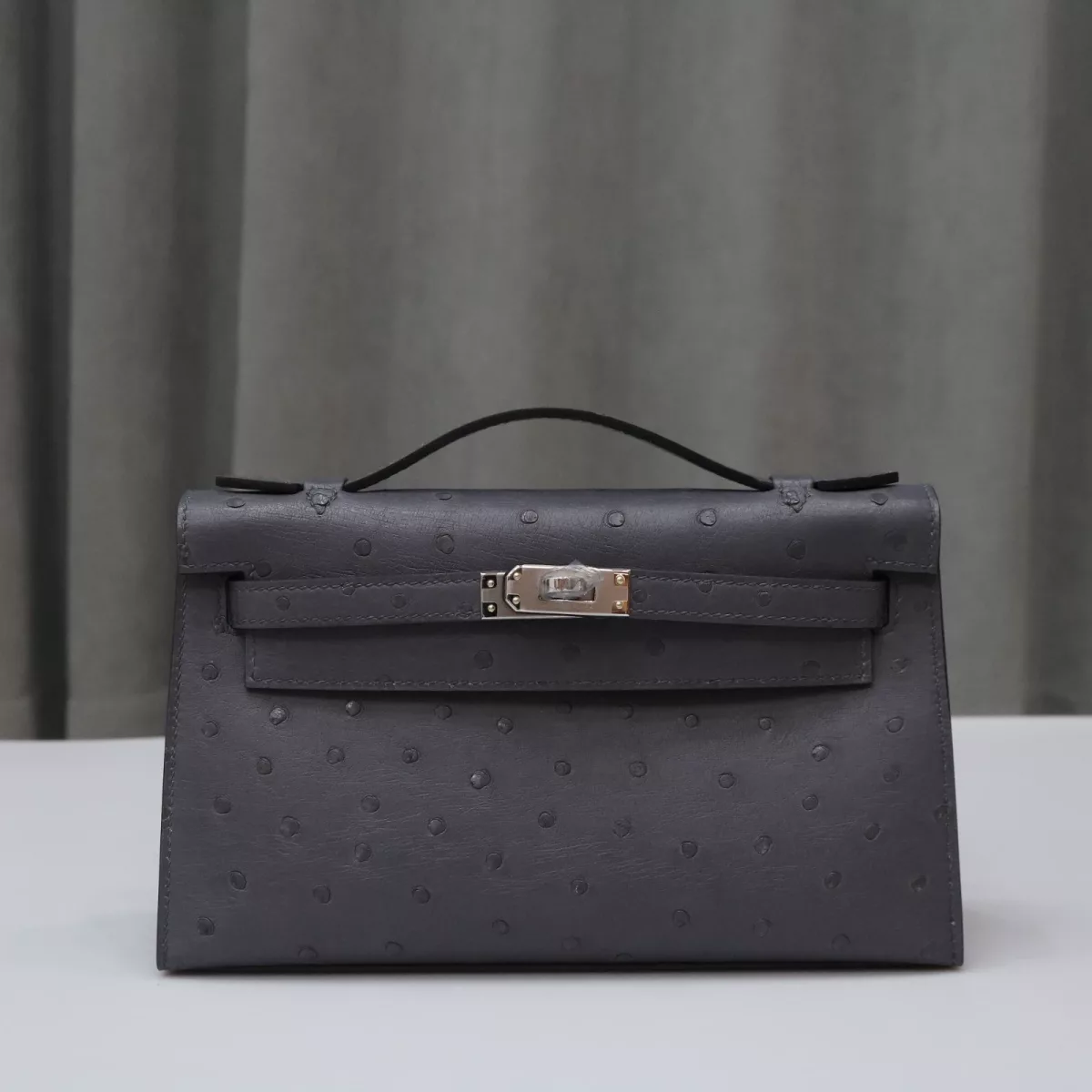 82 Gris Agate ostrich kelly pochette with PHW