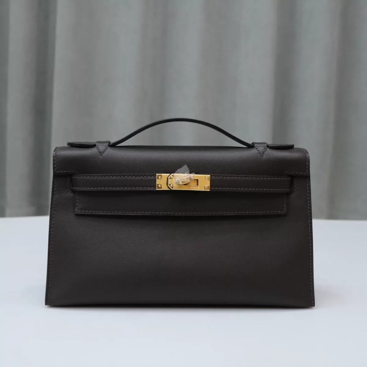 46 Ebene swift kelly pochette with ghw