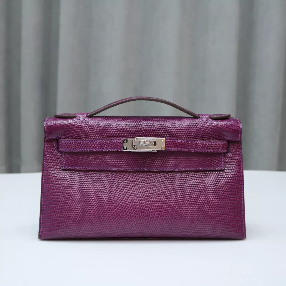 ultraviolet lizard kelly pochette with phw