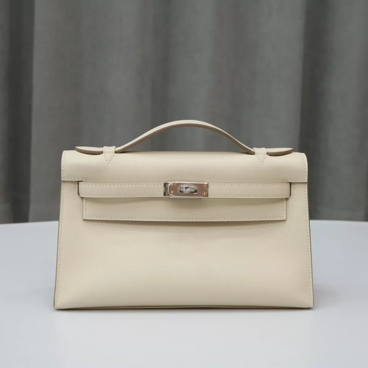 C10 Craie swift kelly pochette with phw