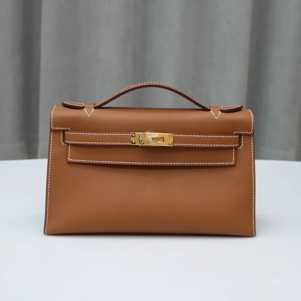 C37 GOLD Swift kelly pochette with ghw