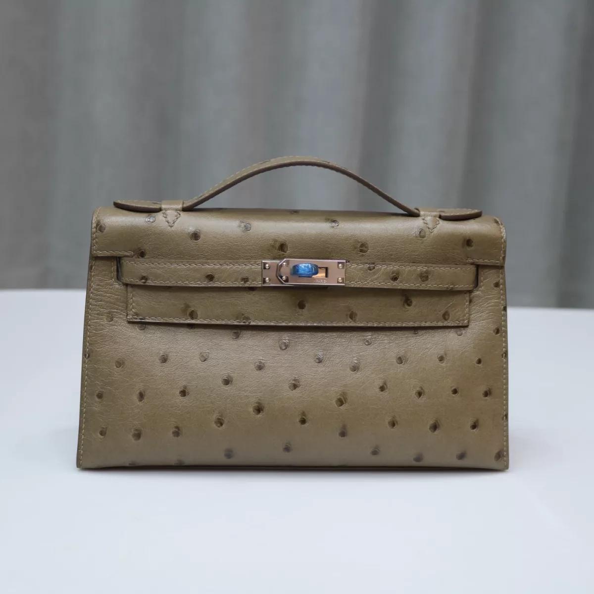 CK18 etoupe ostrich kelly pochette with PHW