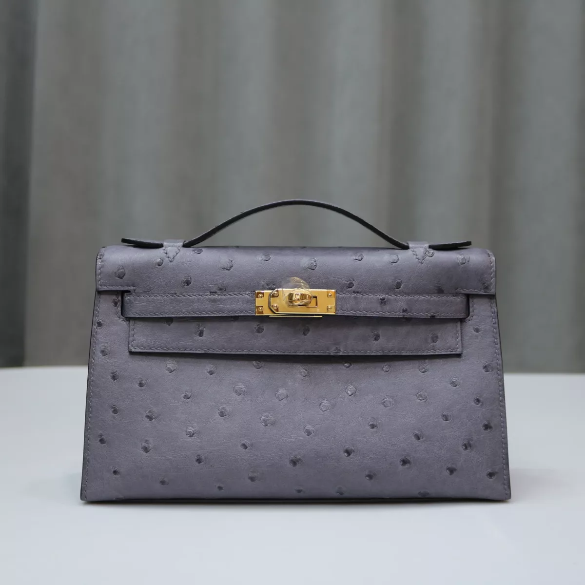 82 Gris Agate ostrich kelly pochette with GHW